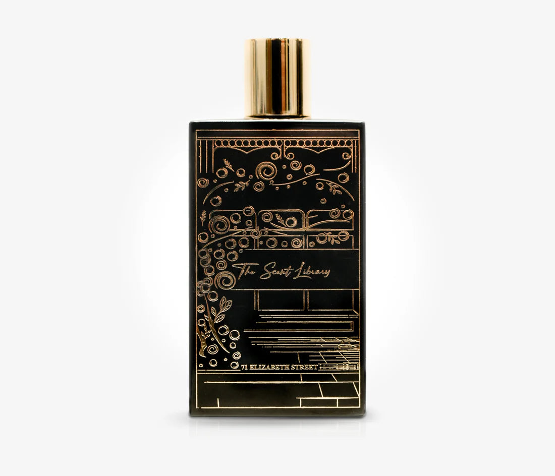 Scent Library perfume bottle with gold detailing and 71 Elizabeth Street - A Story of Heritage and Passion