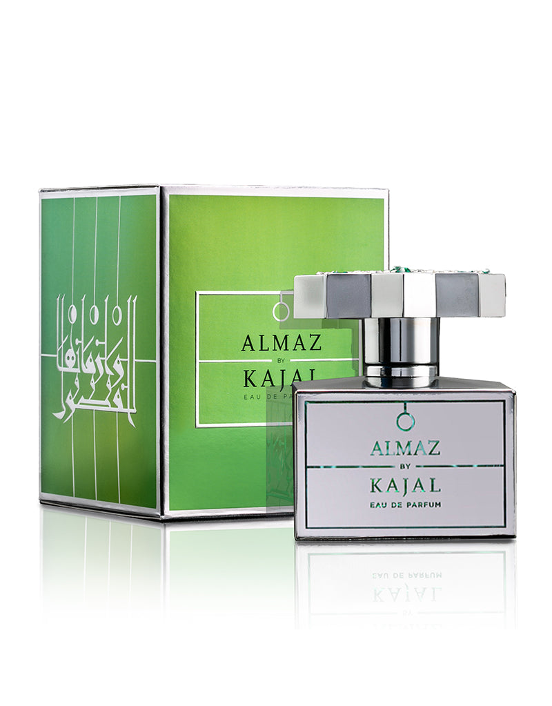 Almaz by Kajal perfume 100ml bottle with elegant geometric design and green accents on green crystal background