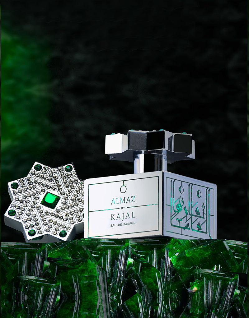 Almaz by Kajal perfume 100ml bottle with elegant geometric design and green accents on green crystal background