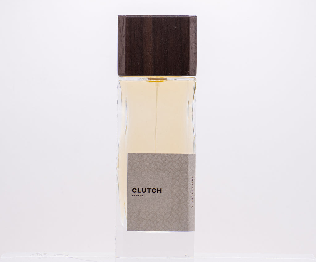Clutch 60ML niche perfume by Perfumology in a sleek bottle with a wooden cap