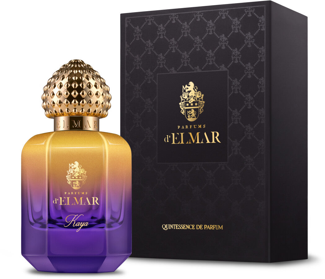 DELMAR Kaya niche perfume bottle with gradient purple and gold design next to elegant black packaging box
