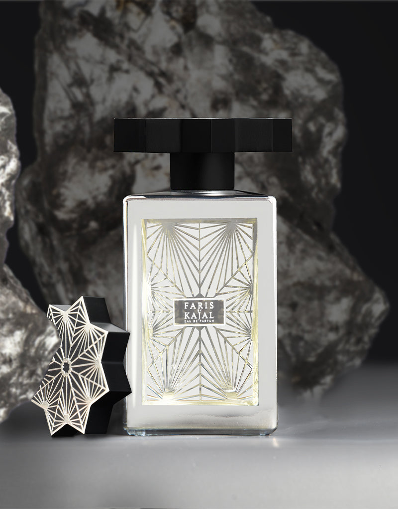 Faris by Kajal perfume bottle with geometric patterned label and decorative black cap on side