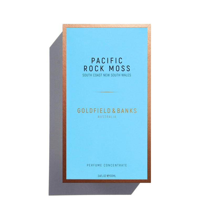 Goldfield & Banks Pacific Rock Moss perfume bottle with aqua blue liquid and textured gold cap