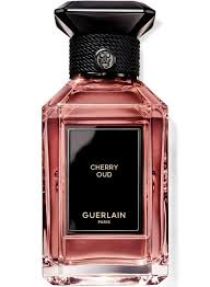 Guerlain Cherry Oud perfume in an elegant bottle featuring a black and pink design
