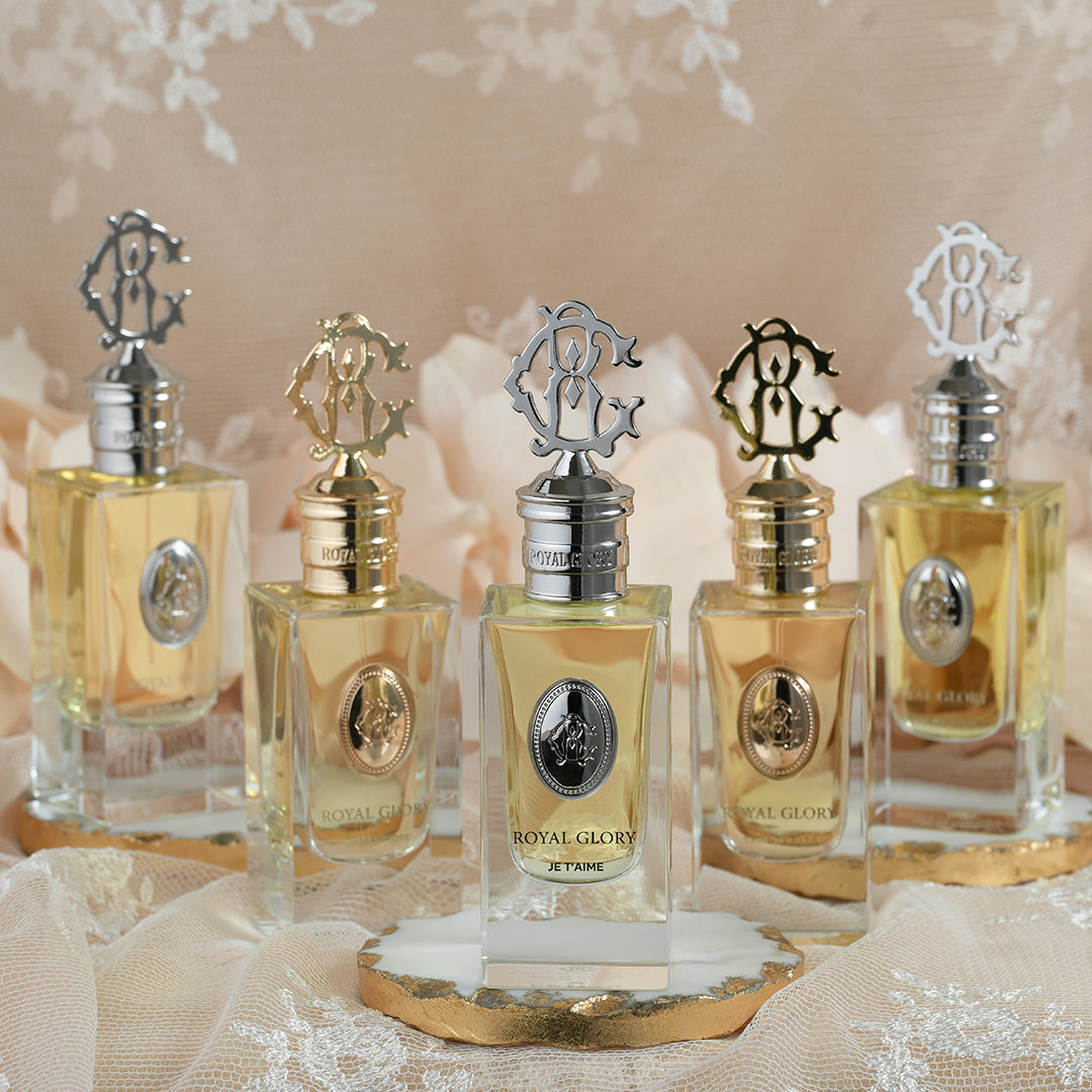 ROYAL GLORY JE T'AIME 60ml niche perfume bottles with elegant metal caps displayed on lace fabric