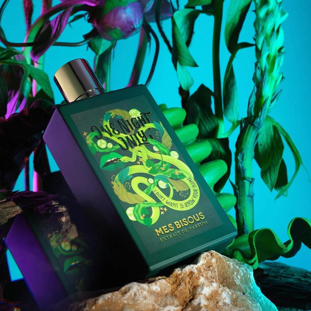 MES BISOUS One Night Only Extrait de Parfum bottle and decorative green snake-themed box
