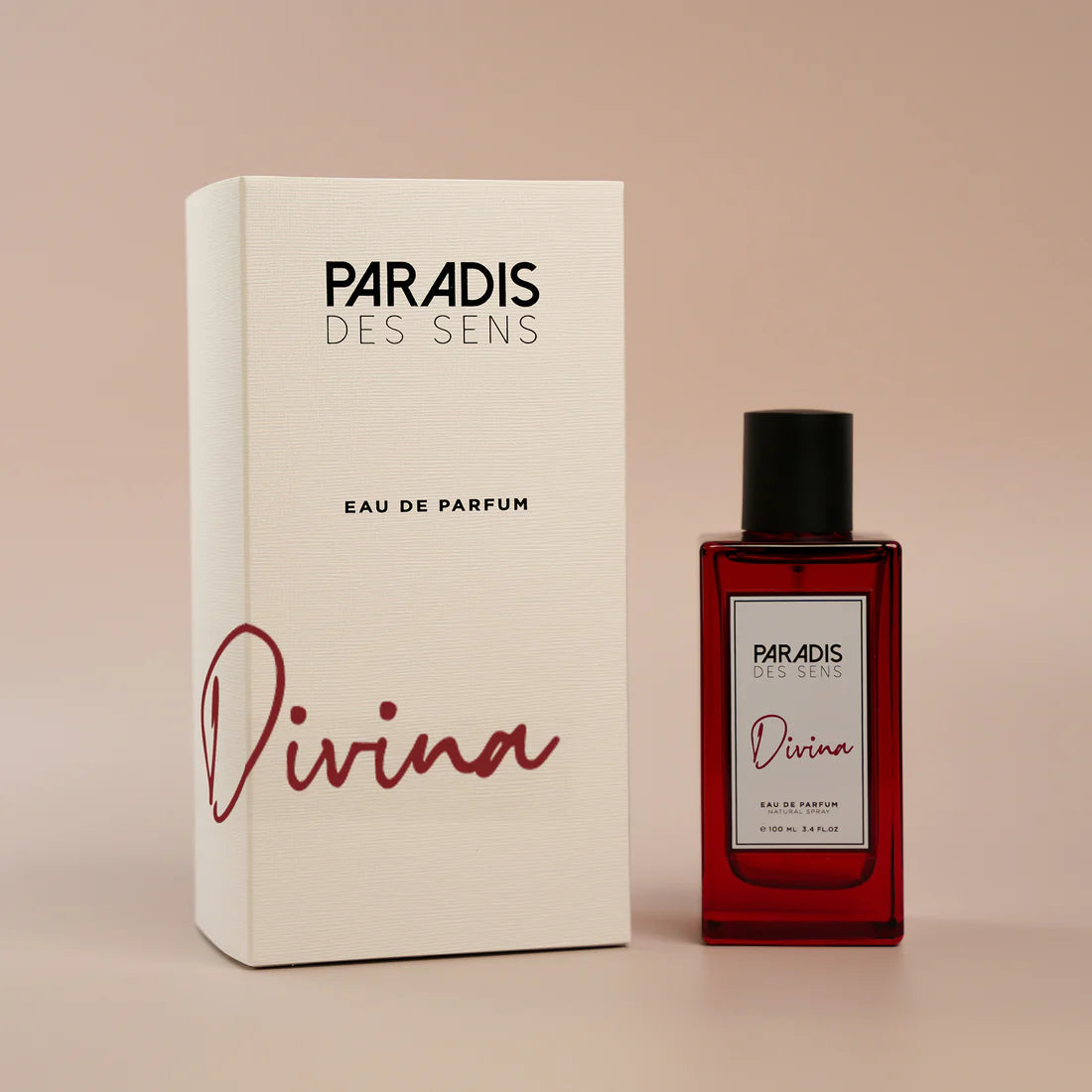 Paradis Des Sens Divina perfume bottle and white box with elegant red and black text by The Scent Library