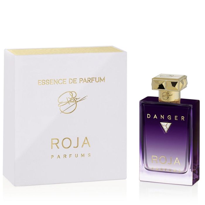 Roja Parfums Danger Pour Femme in a purple glass bottle with elegant packaging for a luxurious fragrance experience
