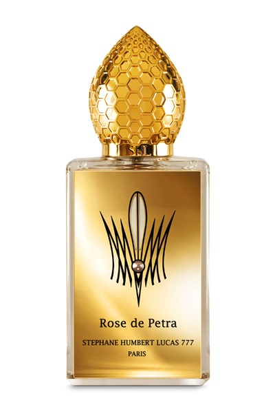 Stephane Humbert Lucas Rose de Petra perfume bottle with gold honeycomb cap and elegant gold label