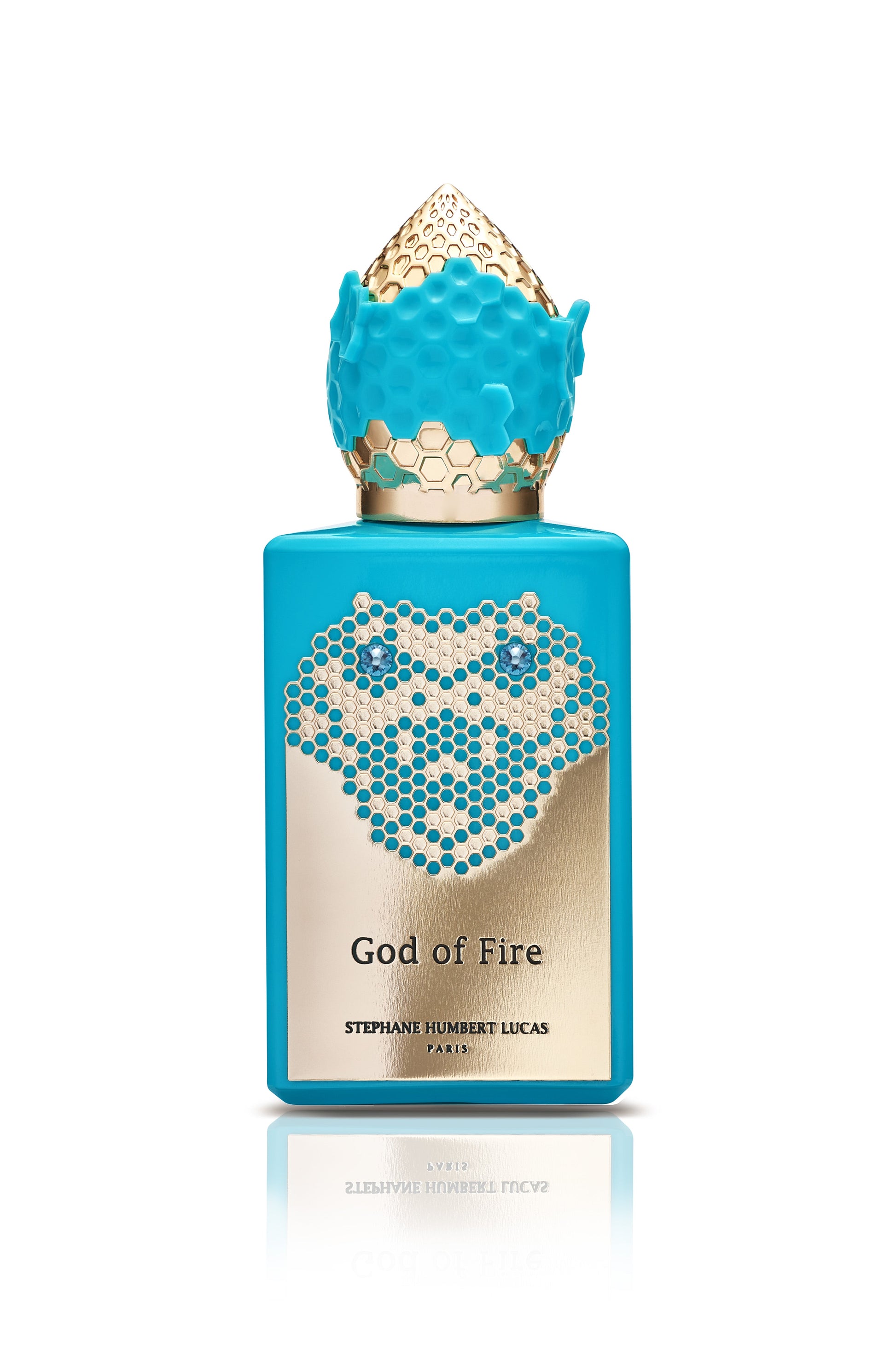 Stephane Humbert Lucas God of Fire niche perfume in a blue and gold decorative bottle