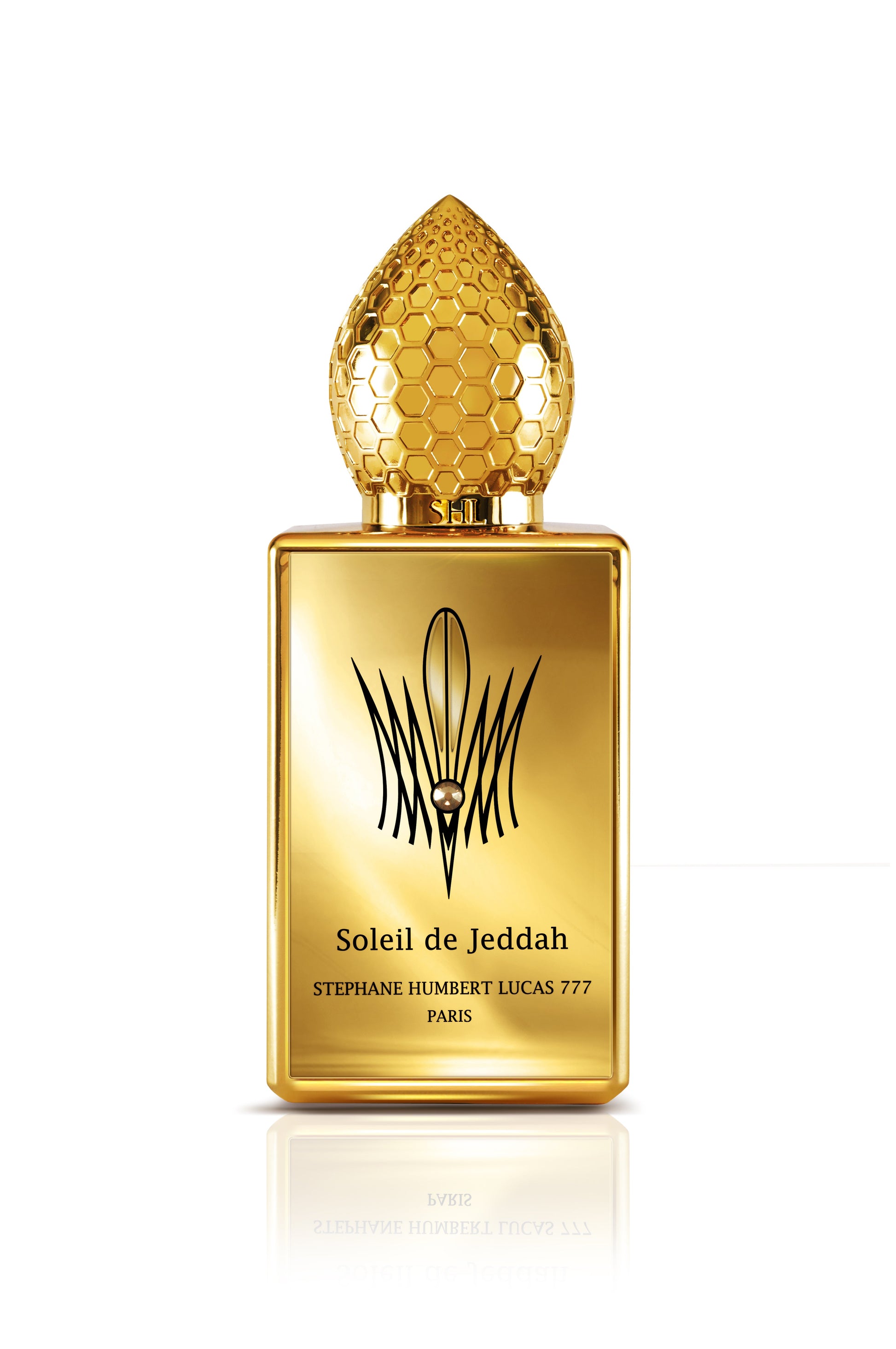 Stephane Humbert Lucas Soleil de Jeddah perfume in gold bottle with honeycomb cap design