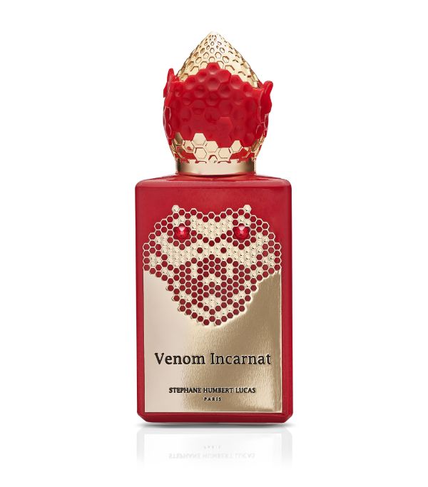 Venom Incarnat perfume by Stéphane Humbert Lucas in a striking red bottle with golden accents