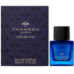 Thameen Carved Oud 50ml perfume in a blue glass bottle with a black ribbed cap by Thameen London fragrance