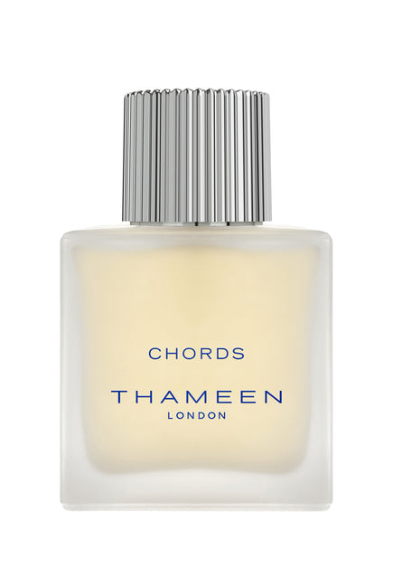 Thameen Chords Cologne Elixir perfume bottle with frosted glass and silver ribbed cap