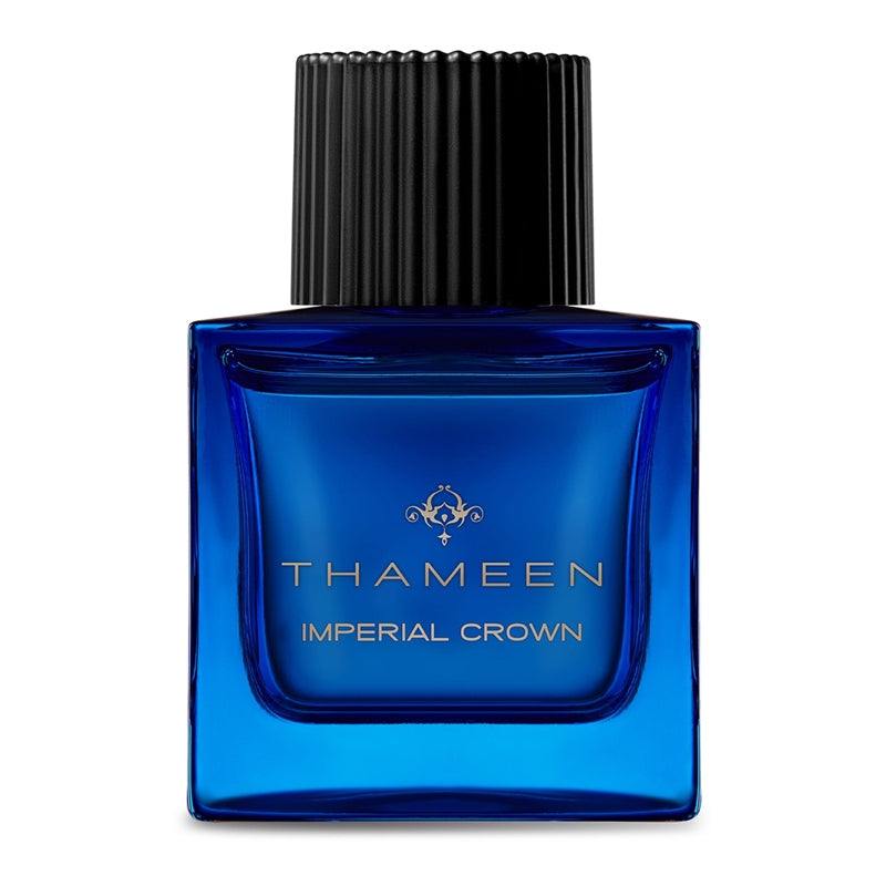 Thameen Imperial Crown perfume in a blue glass bottle with black ribbed cap by Thameen London fragrance
