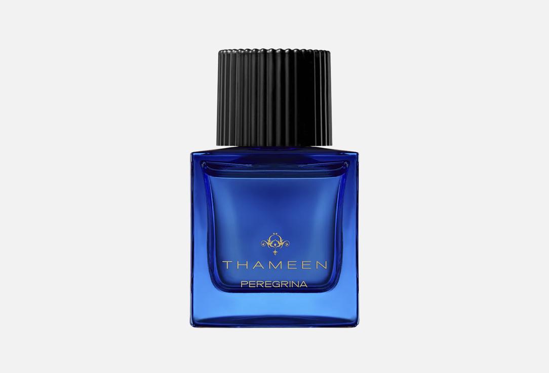Thameen Peregrina perfume in a blue glass bottle with black ribbed cap from Thameen London fragrance