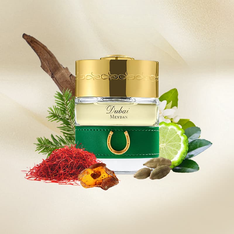 TSD Dubai Meydan eau de parfum by SPIRIT OF DUBAI bottle with green accents and gold cap surrounded by natural ingredients