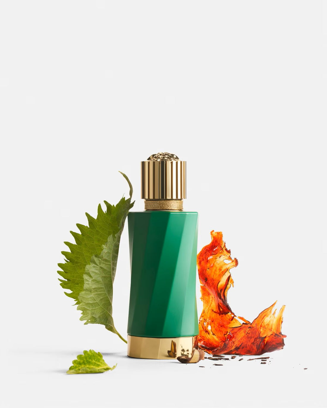 Versace Atelier Patchouly Precieuse EDP 100ml perfume bottle with green leaf and amber resin elements