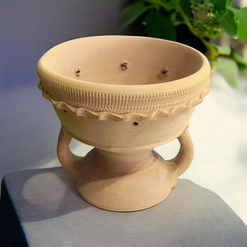 A handcrafted UAE clay bakhoor burner by The Scent Library, used to burn bakhoor over charcoal