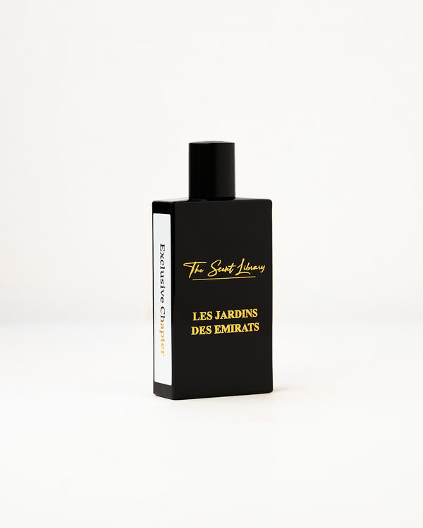 Les Jardins des Emirats eau de parfum by The Scent Library, a glossy black rectangular bottle with a black cap and gold lettering, Exclusive Chapter side label