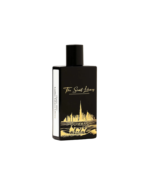 Qimma Collector's Edition by Julien Rasquinet at The Scent Library, a black bottle with gold Dubai skyline and camel artwork, Chapter 2020s Leather Tobacco Library
