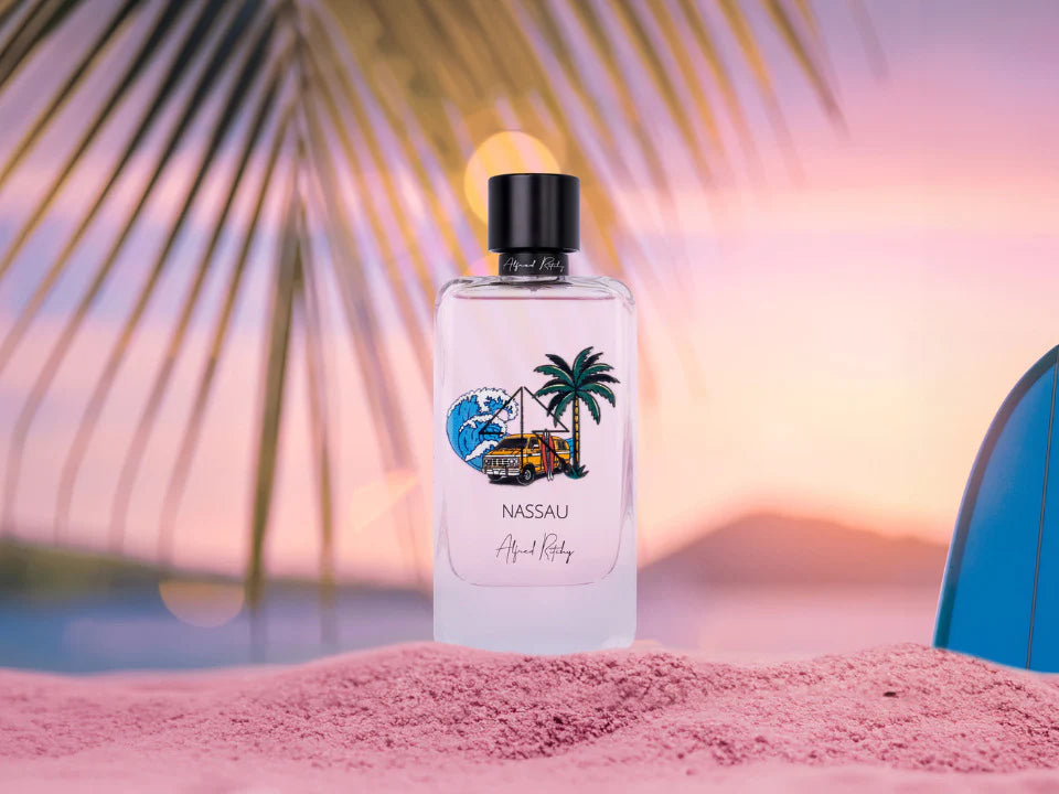 Alfred Ritchy Nassau perfume bottle and pink box featuring beach wave, palm tree, and van design with Alfred Keby Nassau scent
