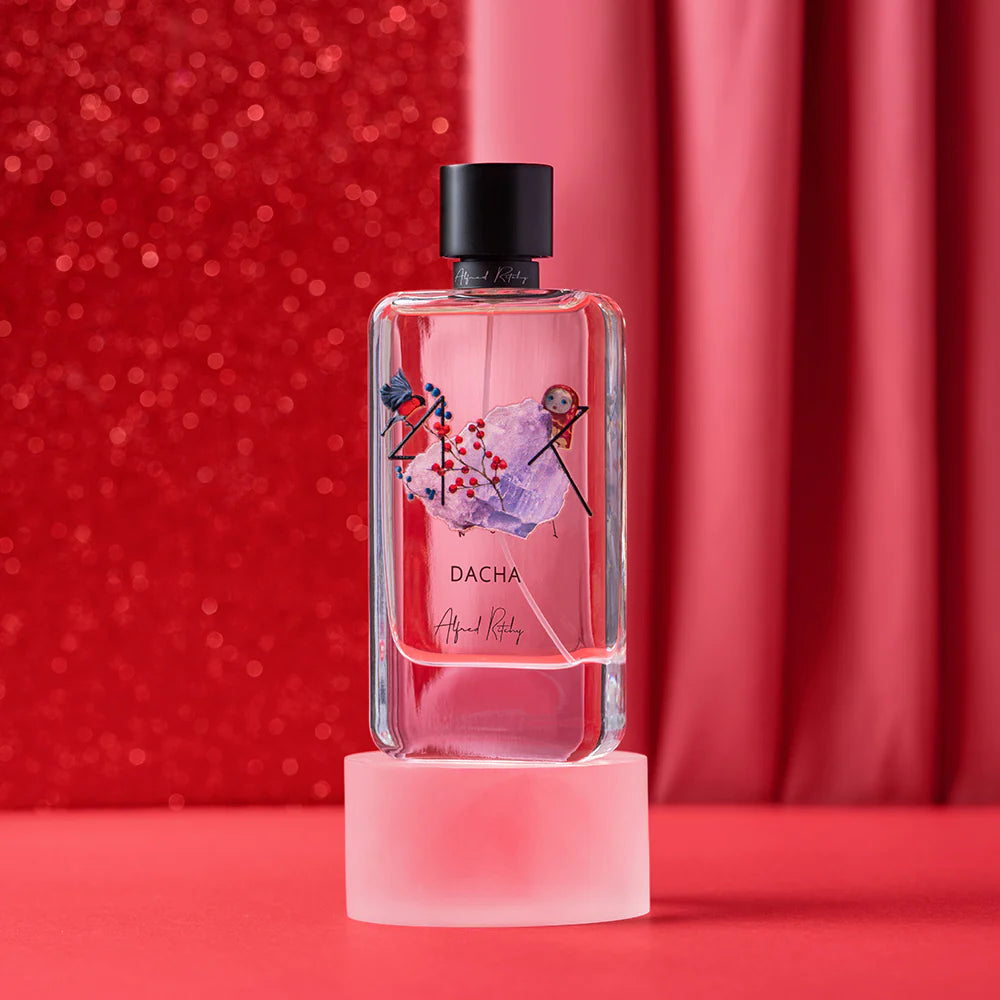 ALFRED RITCHY DACHA niche perfume bottle and red decorative box displayed on white marble surface