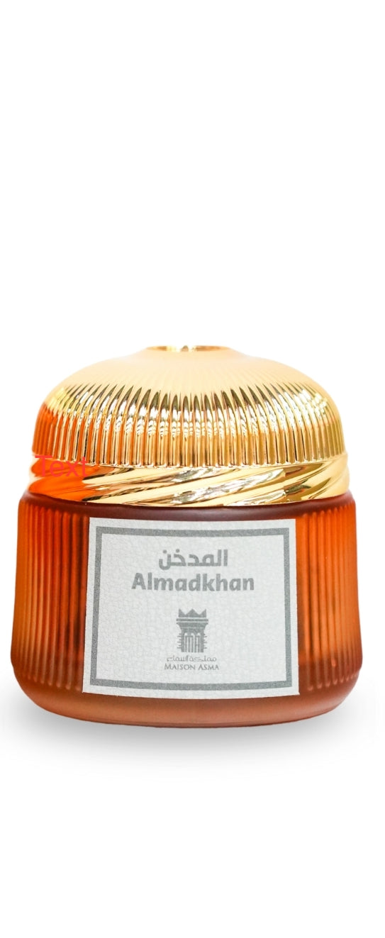 Maison Asma Almadkhan Dhakoun incense perfume in amber glass jar with gold lid