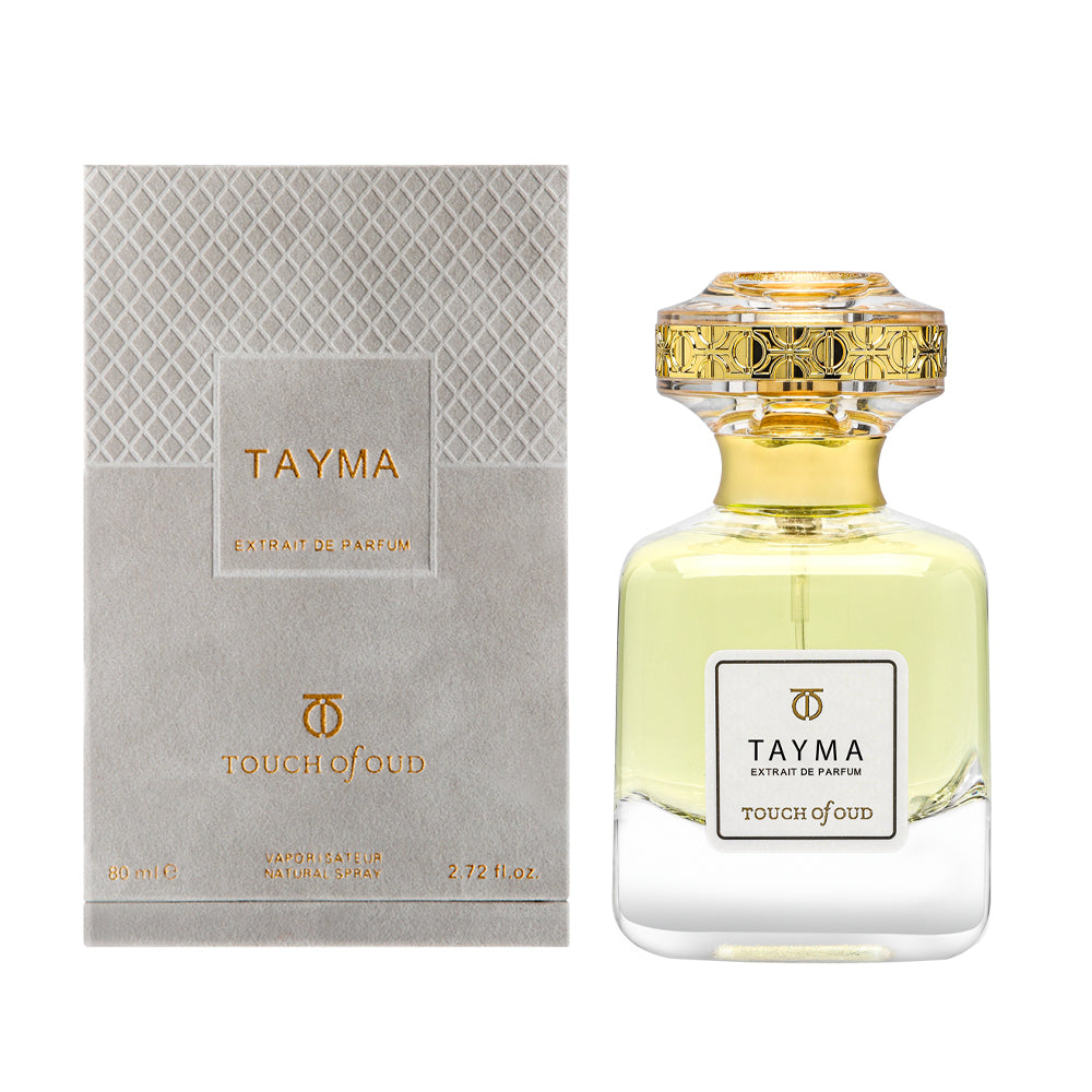 Touch Of Oud Tayma Extrait perfume bottle with gold decorative cap and clear glass design