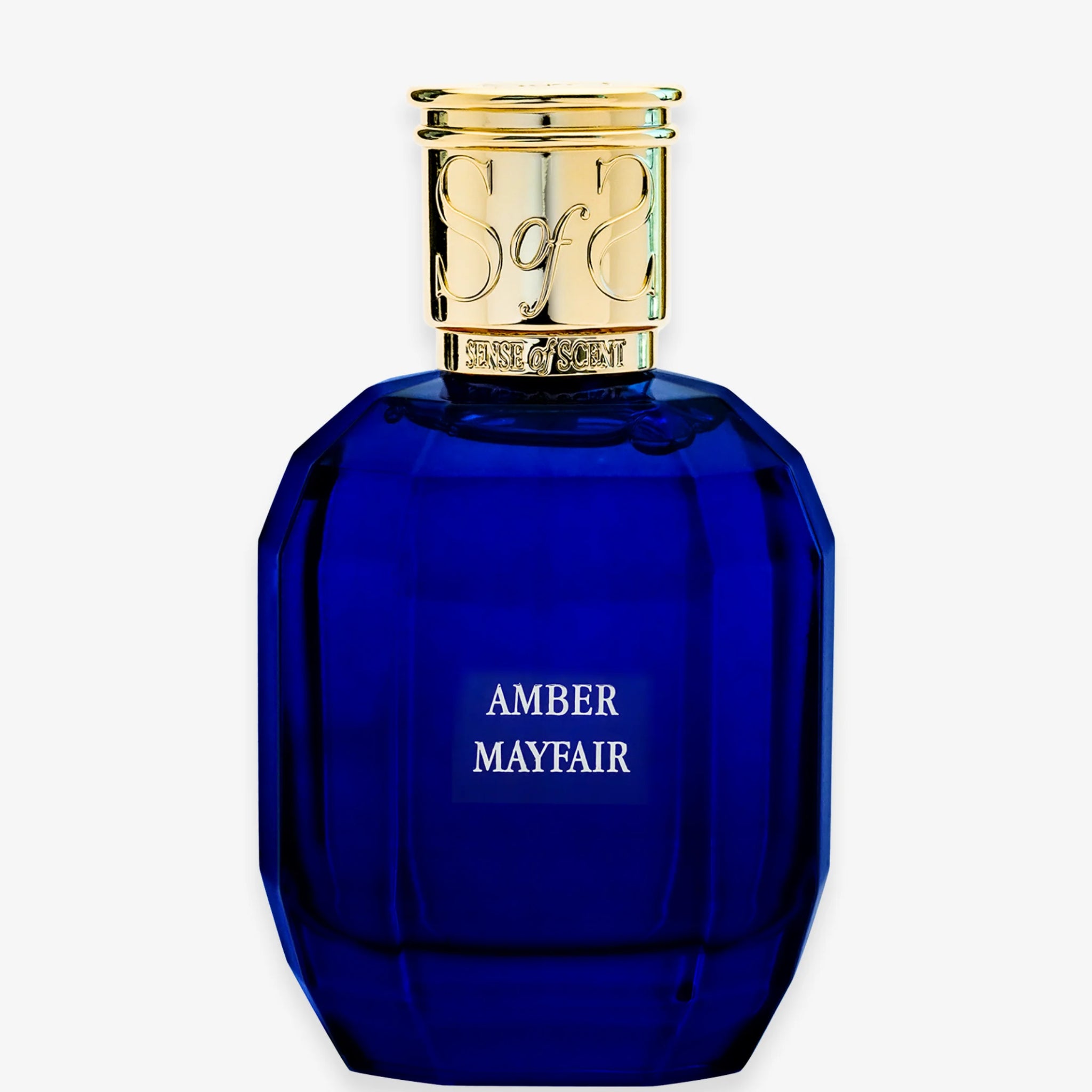 Amber Mayfair perfume by Sense of Scent in a blue faceted glass bottle with gold cap