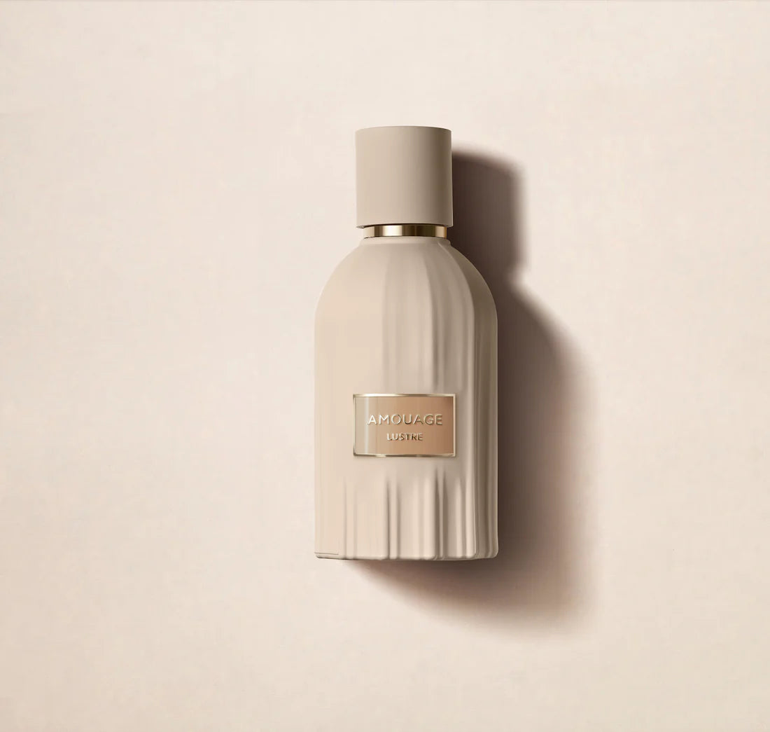 Amouage Lustre perfume Dubai beige bottle with gold label on light background