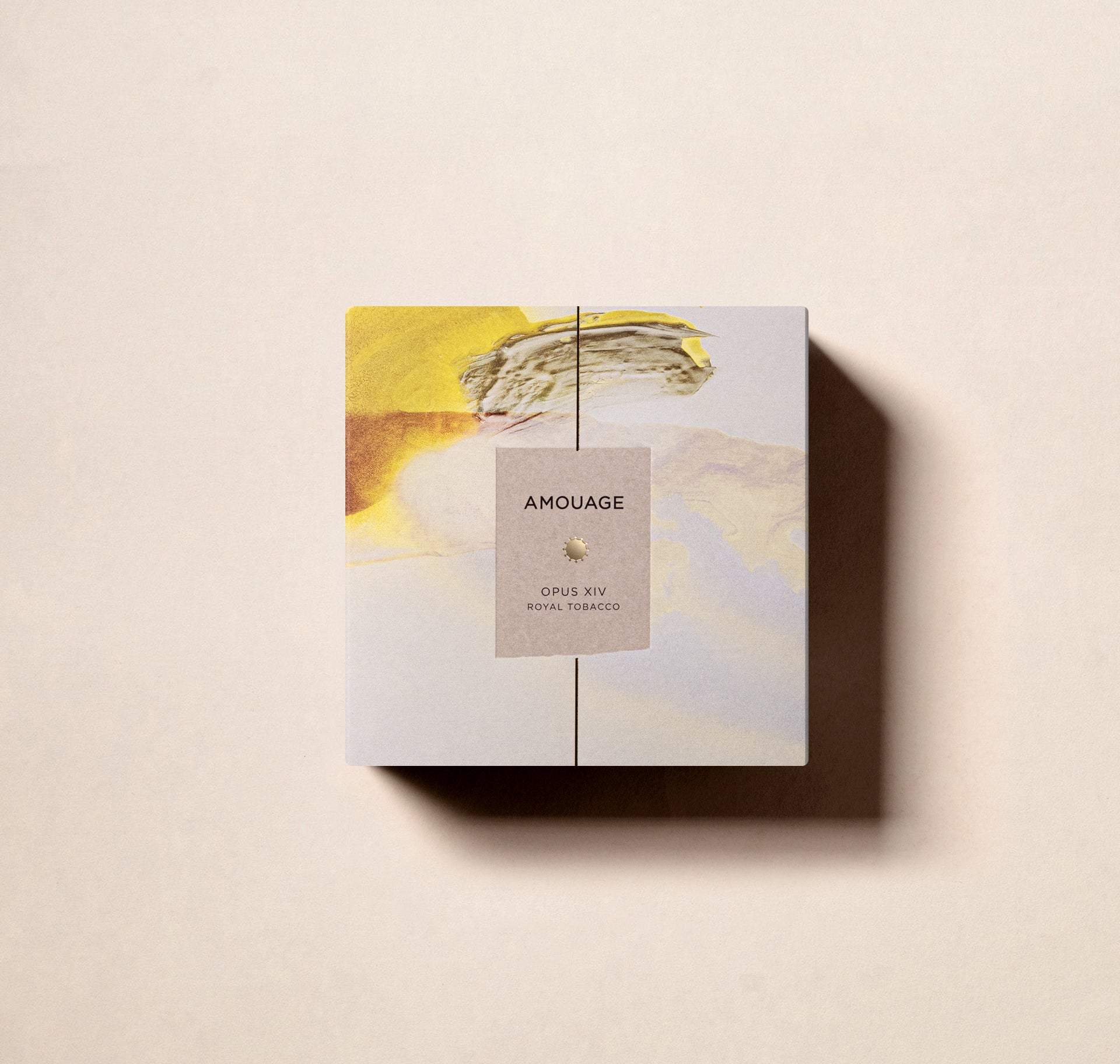 Amouage Opus XIV Royal Tobacco perfume box with abstract yellow and beige design on a light background