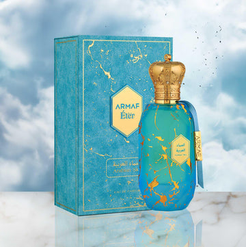 ARMAF Arabian Sky perfume bottle with gold crown cap and matching blue and gold decorative box
