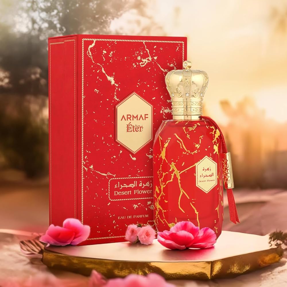 ARMAF Desert Flower perfume bottle and red marble patterned packaging with gold crown cap