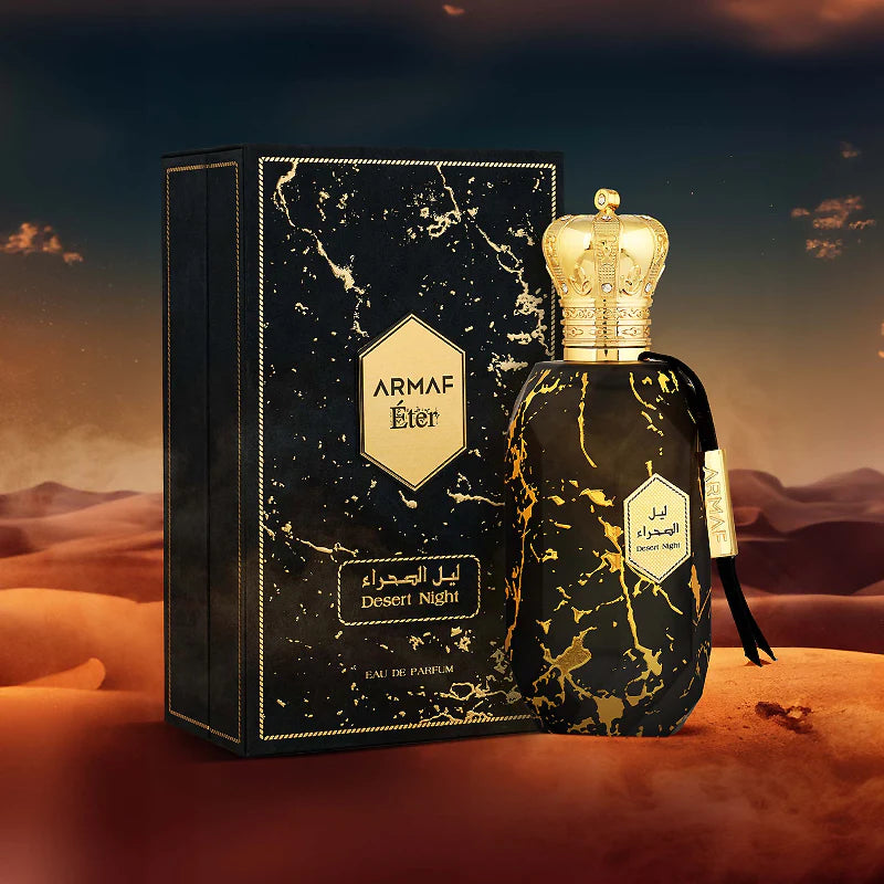 ARMAF ETER DESERT NIGHT EDP 100ML perfume bottle with black and gold design and matching box on desert background