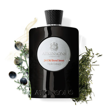 Atkinsons 24 Old Bond Street cologne black bottle with herbs and berries around it