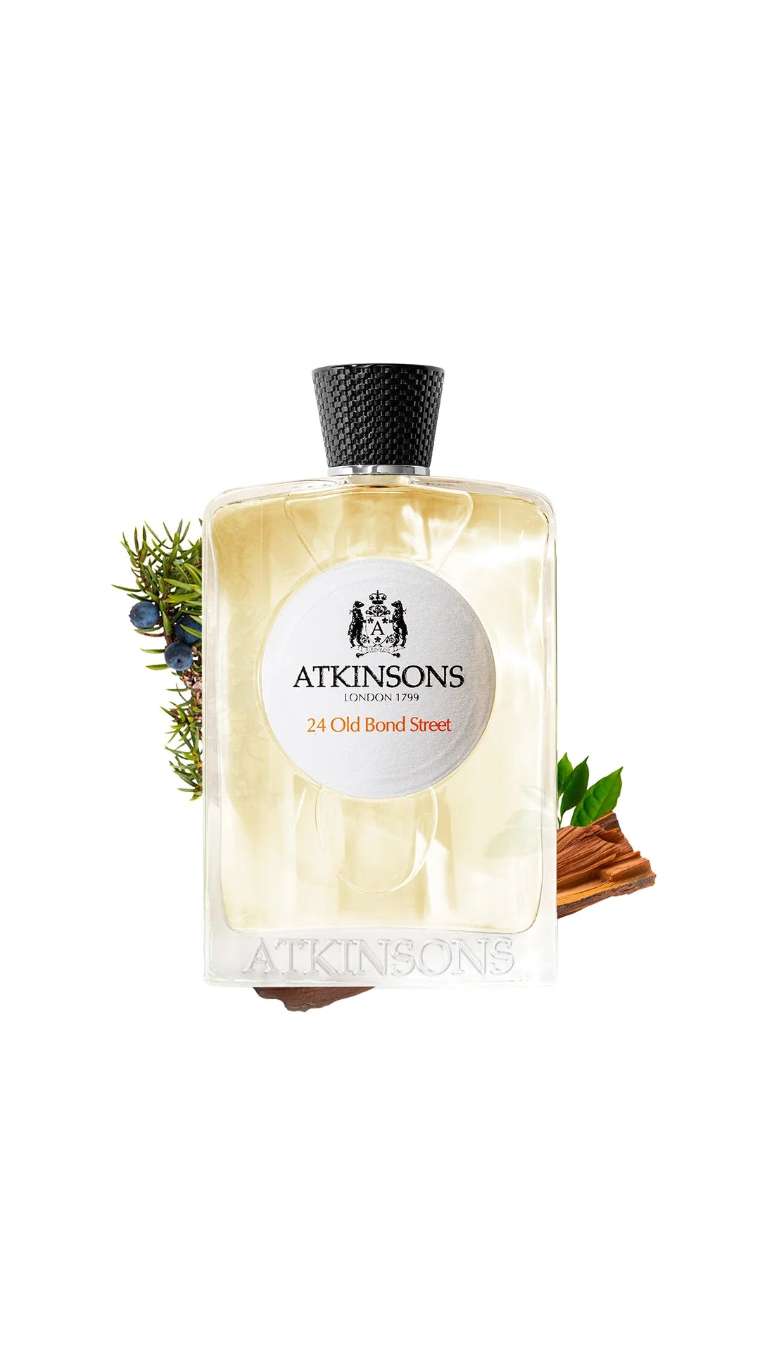 Atkinsons 24 Old Bond Street Eau de Cologne perfume bottle with natural wood and green leaves background