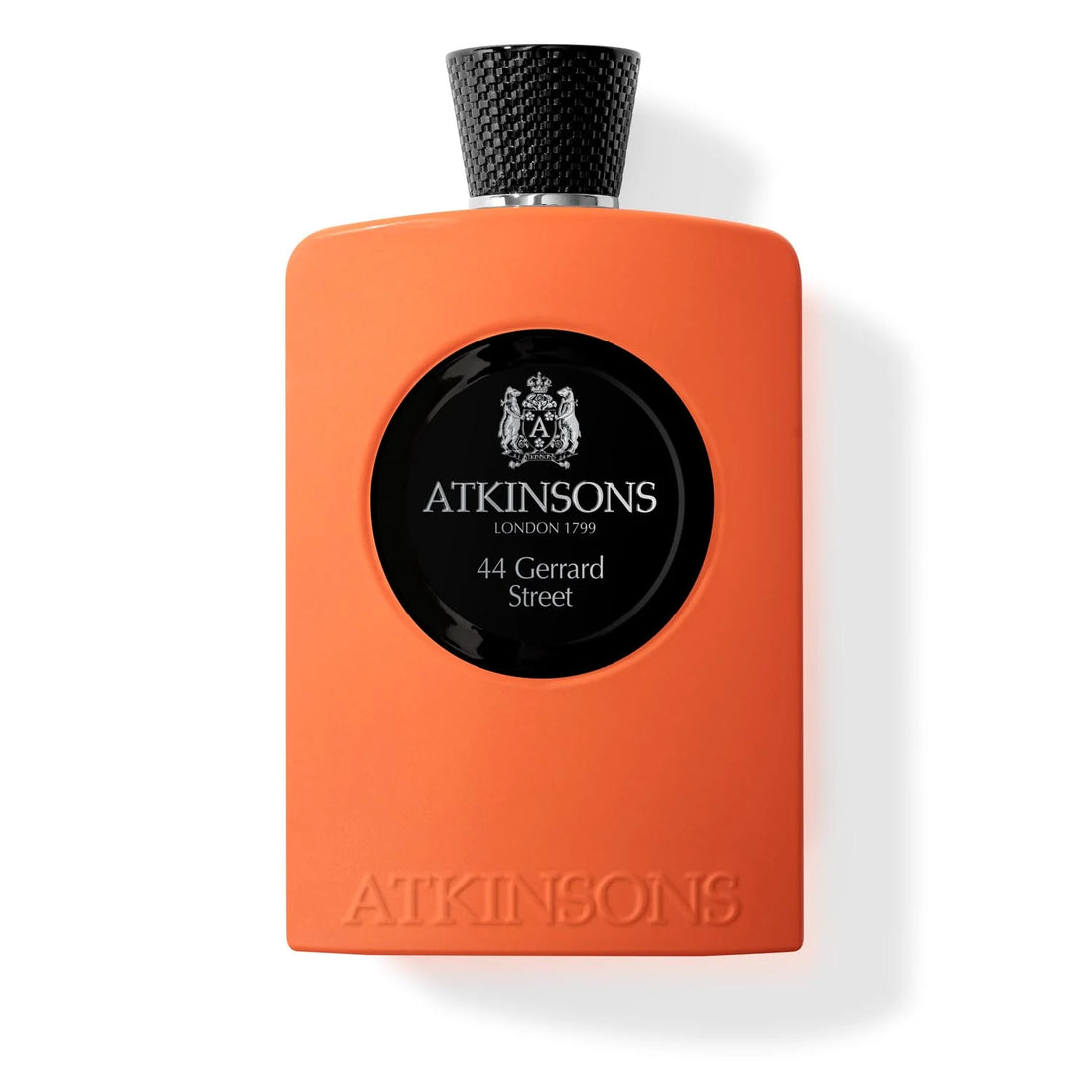 Atkinsons 44 Gerrard Street cologne bottle with citrus, ginger, and green leaves backdrop