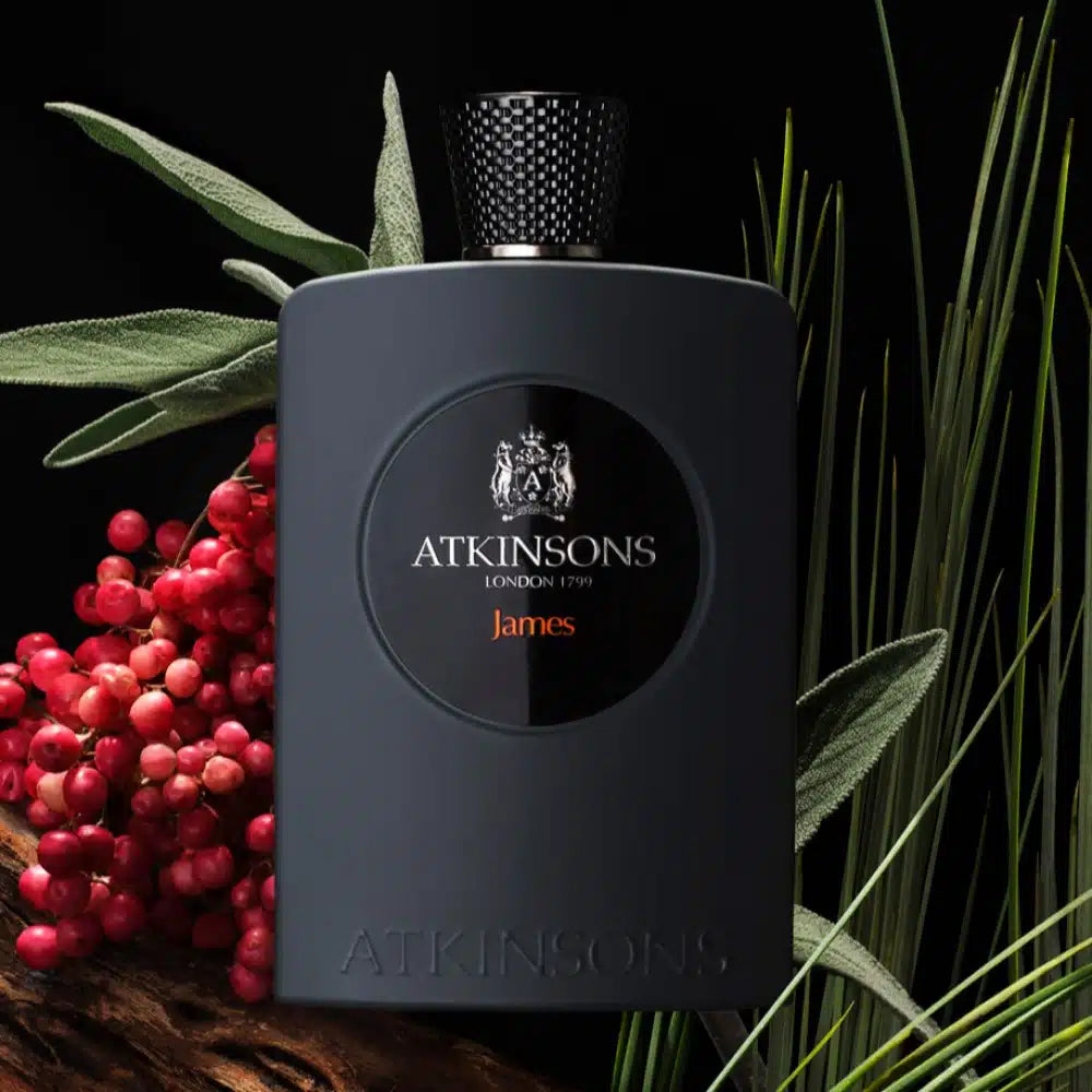 Atkinsons James Eau de Parfum 100ml black bottle with red berries and green leaves background