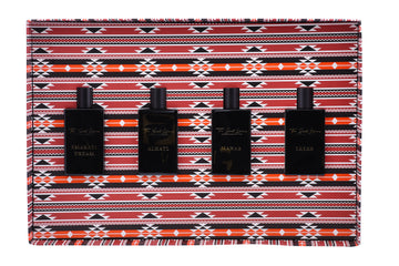 Baytak Collector’s Edition perfume set featuring four elegant black bottles in a decorative gift box