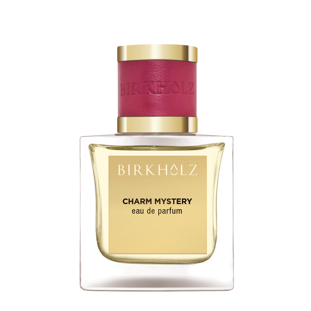 Birkholz Charm Mystery eau de parfum bottle with gold label and red cap