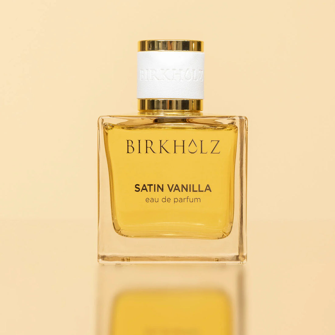 Satin Vanilla Birkholz eau de parfum in a clear square glass bottle with gold and white cap