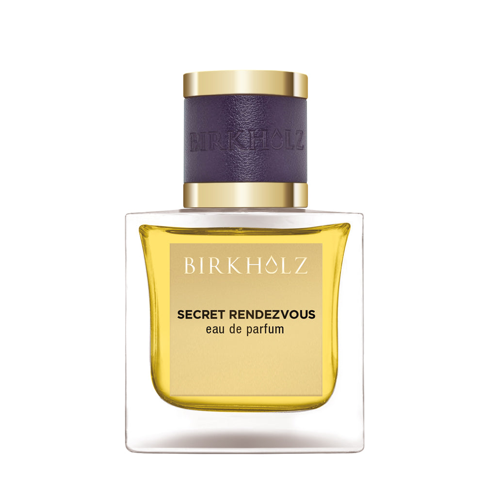 Birkholz Secret Rendezvous Eau de Parfum in a clear glass bottle with gold and purple cap