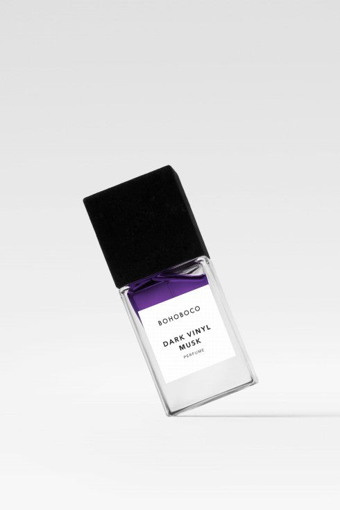 BOHOBOCO Dark Vinyl Musk Perfume in a sleek bottle with a black cap for a captivating fragrance experience