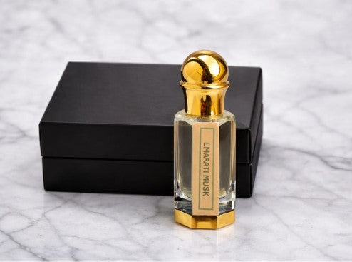The Scent Library EMARATI MUSK 50ml bottle with a golden cap and a black box, featuring a rich musky scent