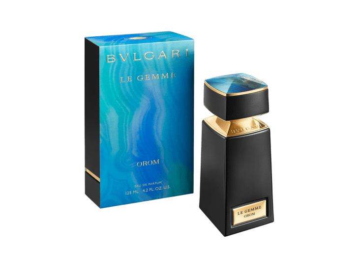 Bvlgari Le Gemme Orom Eau De Parfum black bottle with gold accents and blue cap against black background