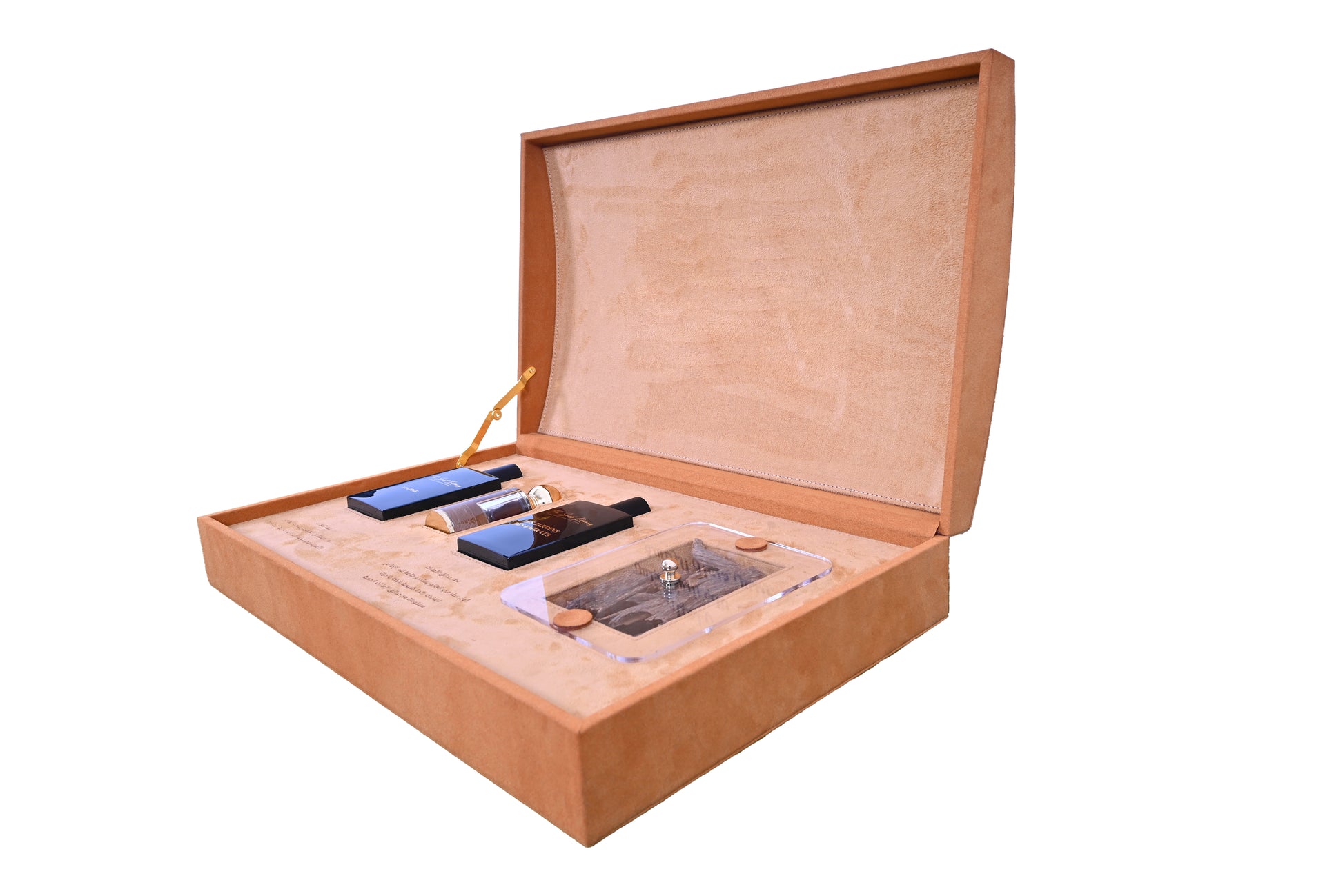 Scent Library camel leather perfume collection displayed in a luxury suede box with multiple perfume bottles