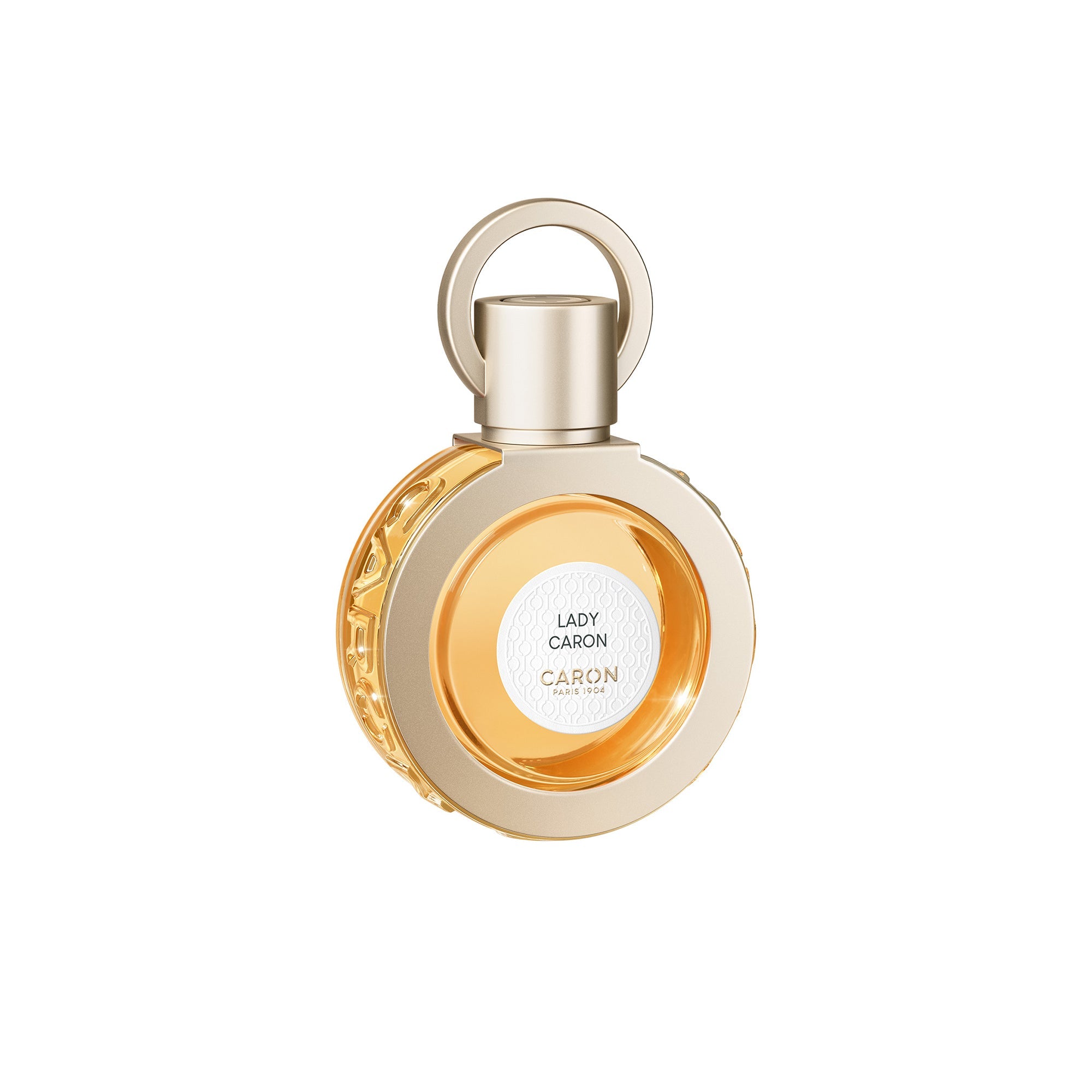 Caron Lady Caron Eau de Parfum in a round gold bottle with a loop handle