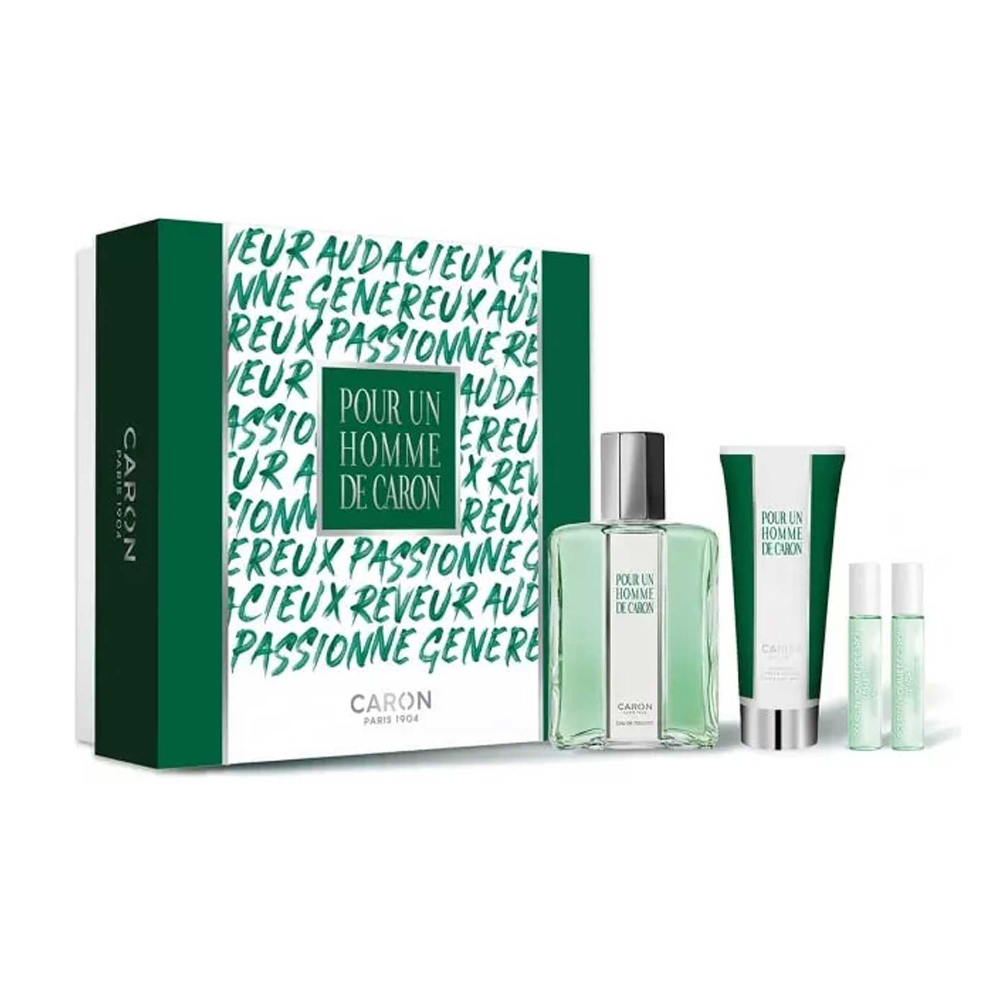 Pour Un Homme De Caron gift set with eau de toilette, body lotion, and travel sprays in green and white packaging