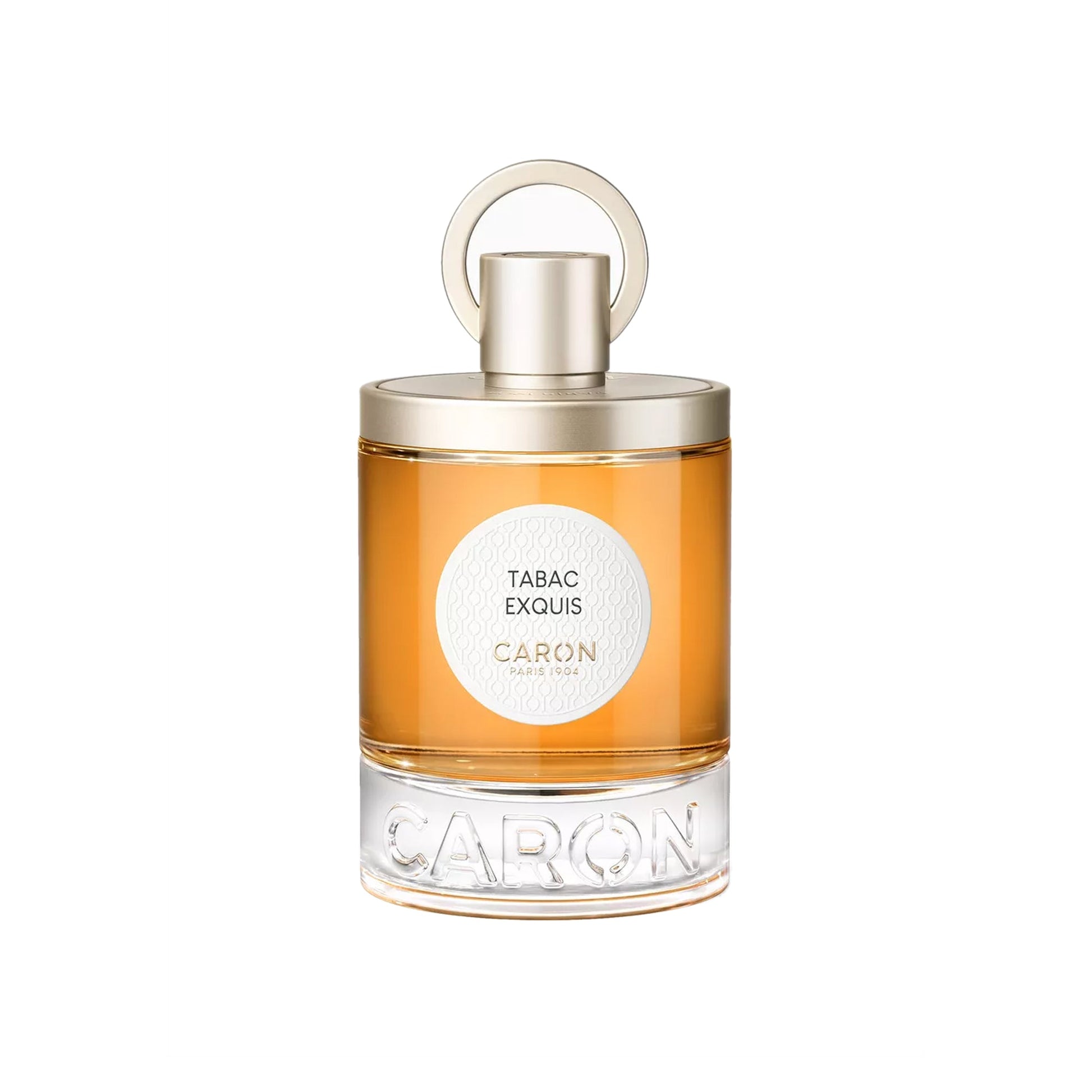 Caron Tabac Exquis Eau de Parfum in clear glass bottle with gold cap and amber liquid
